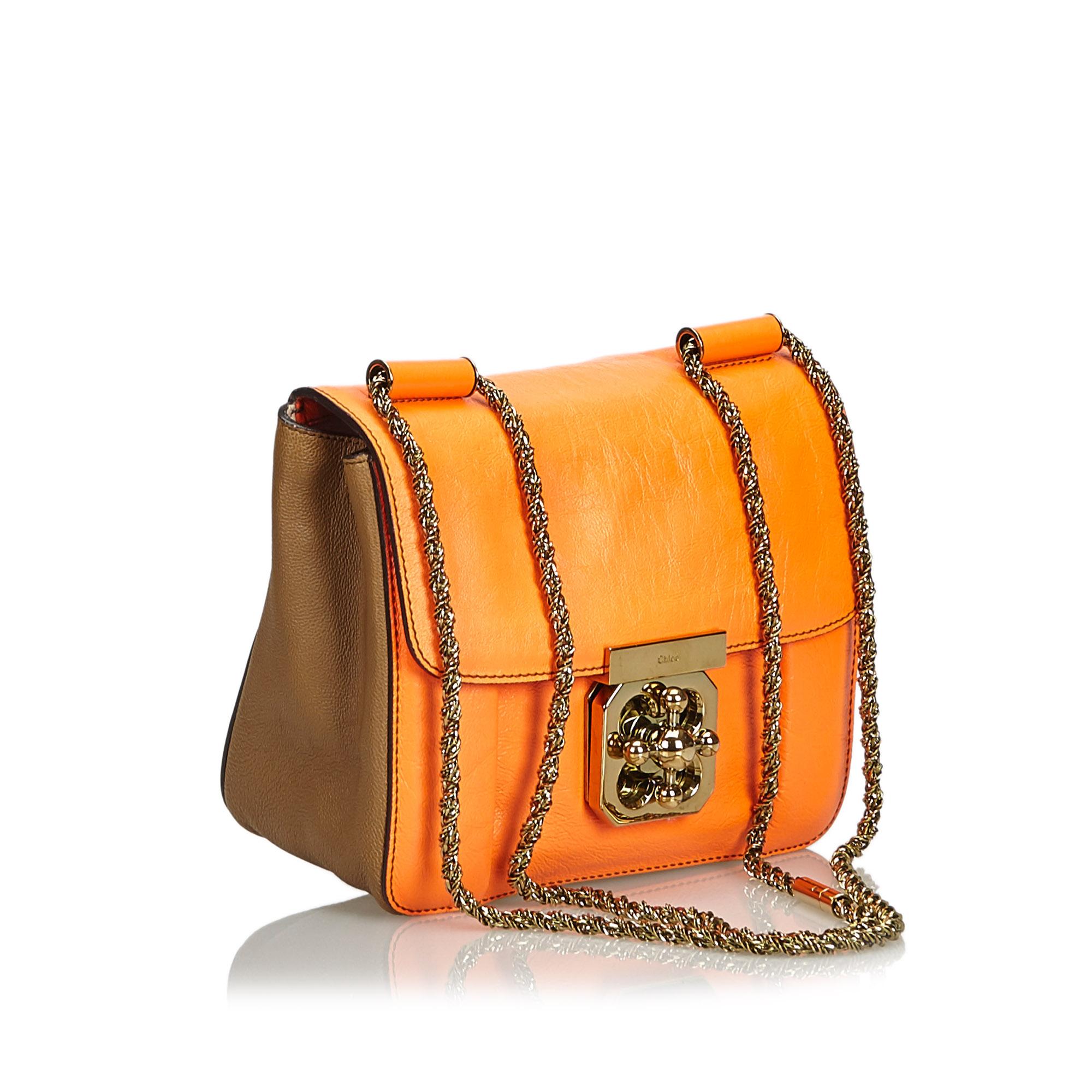 The Elsie crossbody bag features a leather body, chain link straps, a top flap with a twist lock closure, and an interior slip pocket. It carries as B+ condition rating.

Inclusions: 
Dust Bag
Authenticity Card

Dimensions:
Length: 17.00 cm
Width: