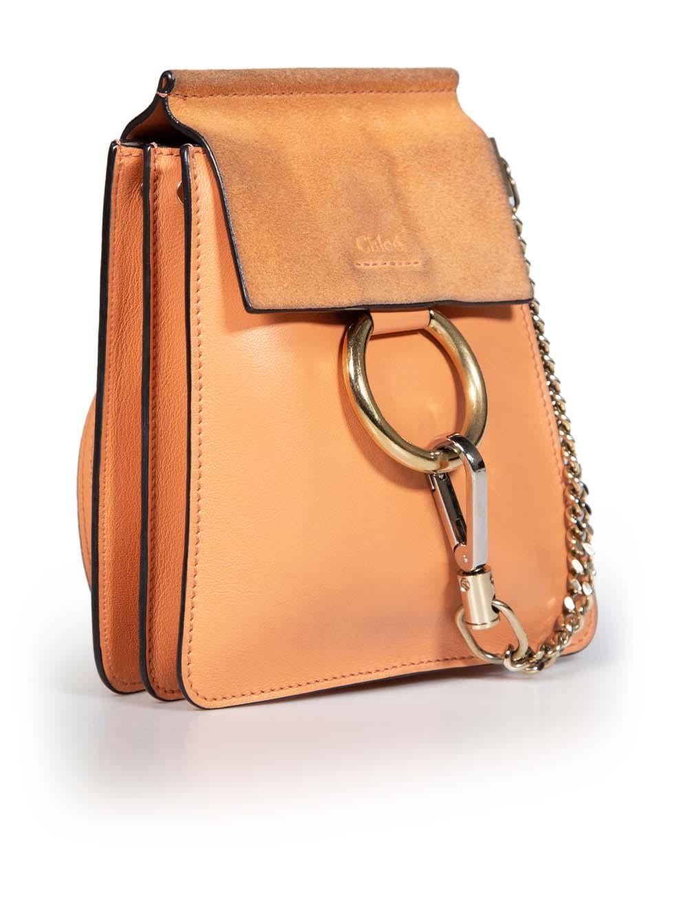 CONDITION is Good. General wear to the bag is evident. Light discolouration to the front, overall suede flap and rear centre. Small scratches to the rear bottom, on the hardware to the left side and internal rear pocket. Slight tarnishing to the