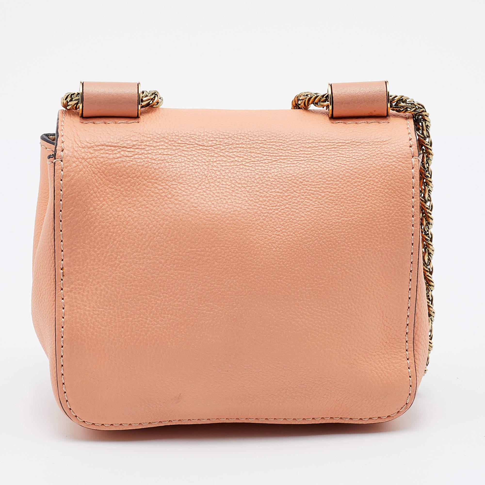 Designed to be durable, this lovely crossbody bag is a prized buy. Chic and easy to carry, the creation comes with a long shoulder strap and a spacious interior to keep your essentials safe.

Includes: Original Dustbag