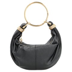 Borsa Hobo Chloé in pelle di vitello martellata — Nera