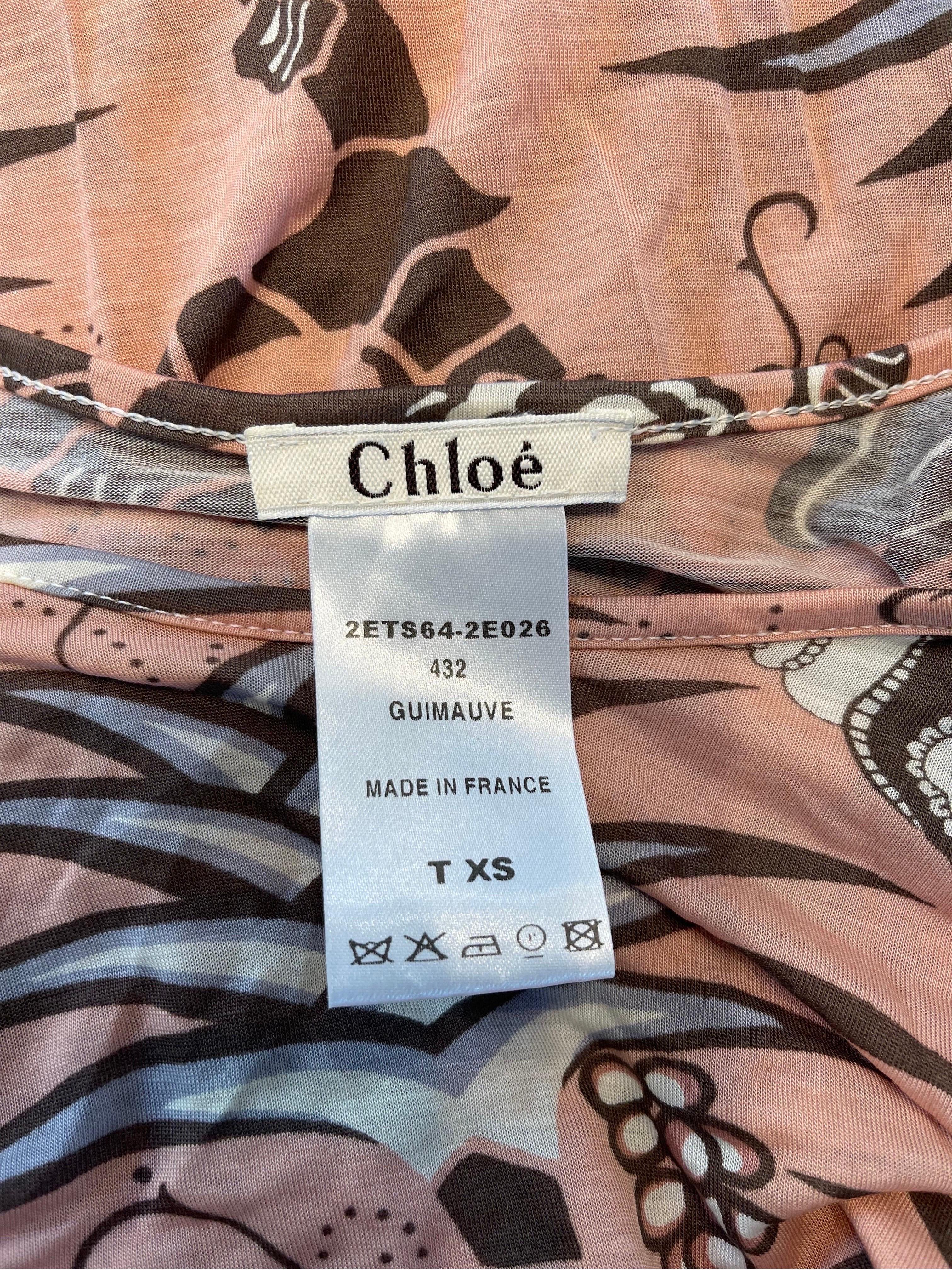 Rare and collectible Spring / Summer 2002 CHLOE by PHOEBE PHILO novelty monkey and butterfly print long sleeve top ! This amazing blouse is from Philo’s premiere collection for the house of Chloe. Soft rayon stretches to fit. Pink / salmon color,