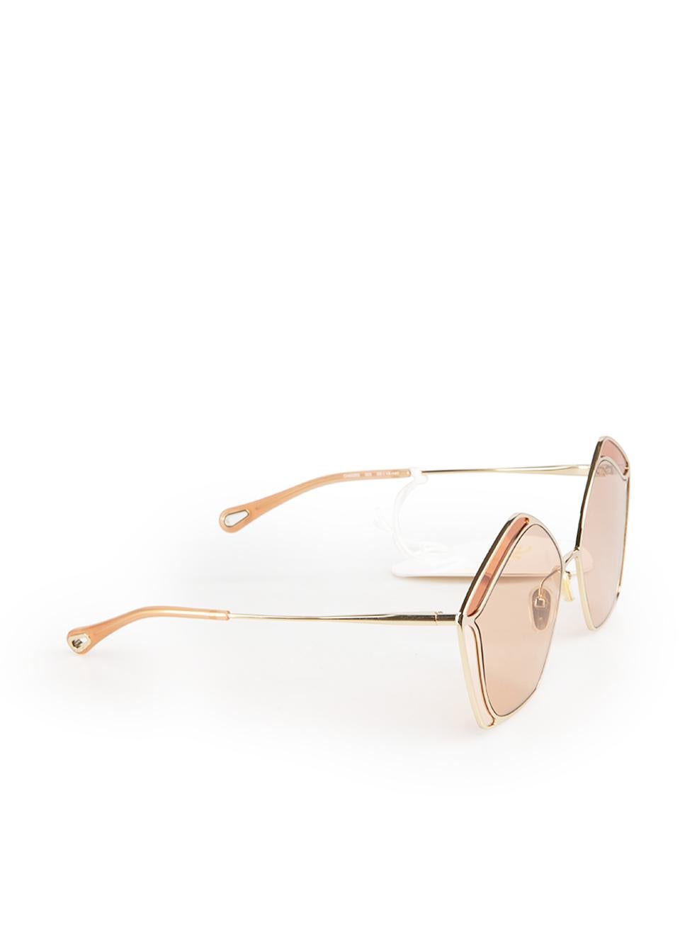 CONDITION is Never worn, with tags. No visible wear to sunglasses is evident on this new Chloé designer resale item. Comes in original case with box.
  
Details
Gemma model
Pink
Metal
Sunglasses
Geometric frame
Tinted pink lenses
  
Made in