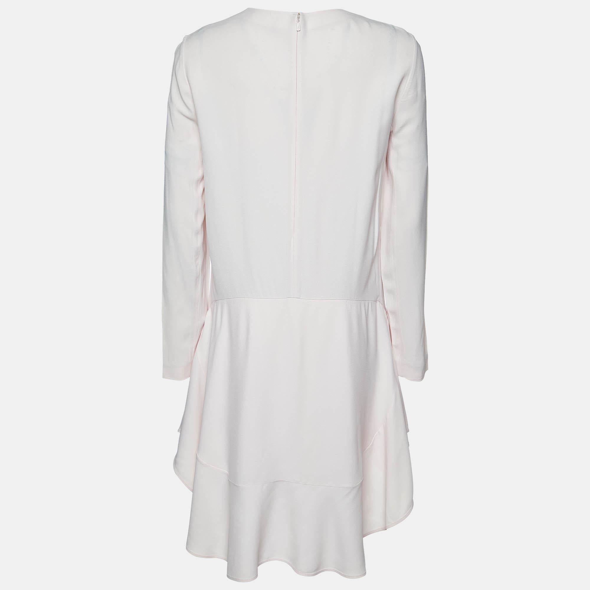 Experience the joy of expert tailoring with this designer dress for women. Meticulously made it offers a flawless fit and luxe details ensuring unmatched comfort. This beautiful creation will elevate your style effortlessly.