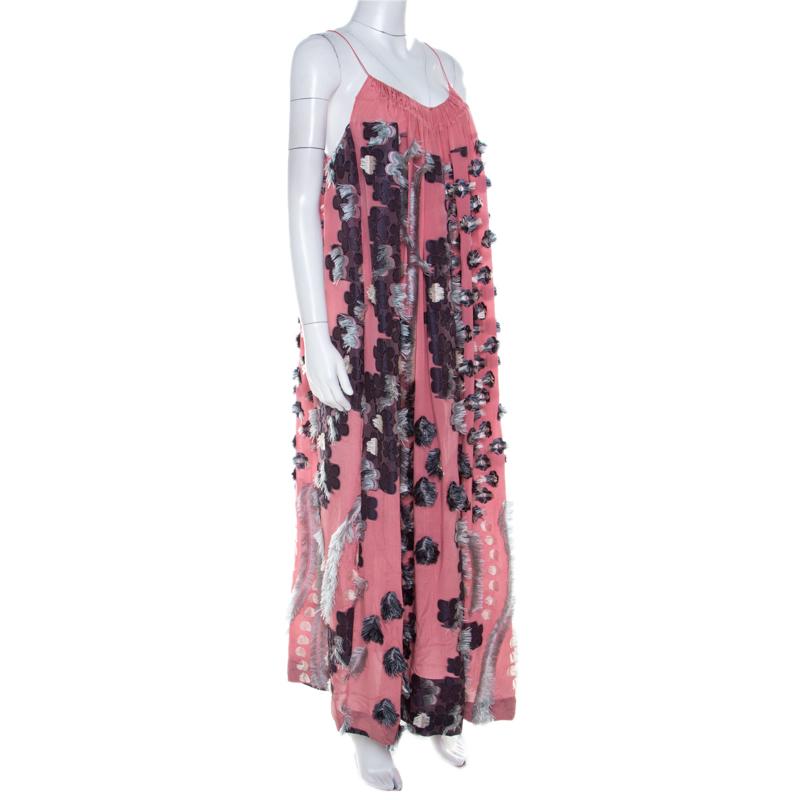 It's time you rocked a maxi dress from Chloe. This pink dress is made of silk and features feather applique embellished all over it. This creation flaunts noodle straps and two external pockets.

Includes: The Luxury Closet Packaging

The Luxury