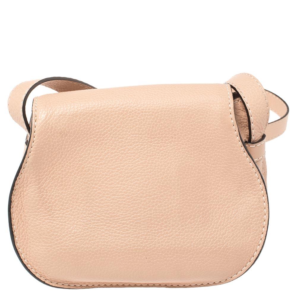 Stunning to look at and durable enough to accompany you wherever you go, this Chloe creation is a joy to own! This Marcie bag is crafted from leather with a single shoulder strap and a well-designed front exterior enhanced with stitch details and