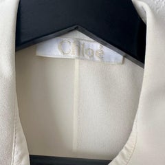 Chloé Pre-Fall '15: blusa romantica con volant in seta color latte FR 36 US 4 senza maniche