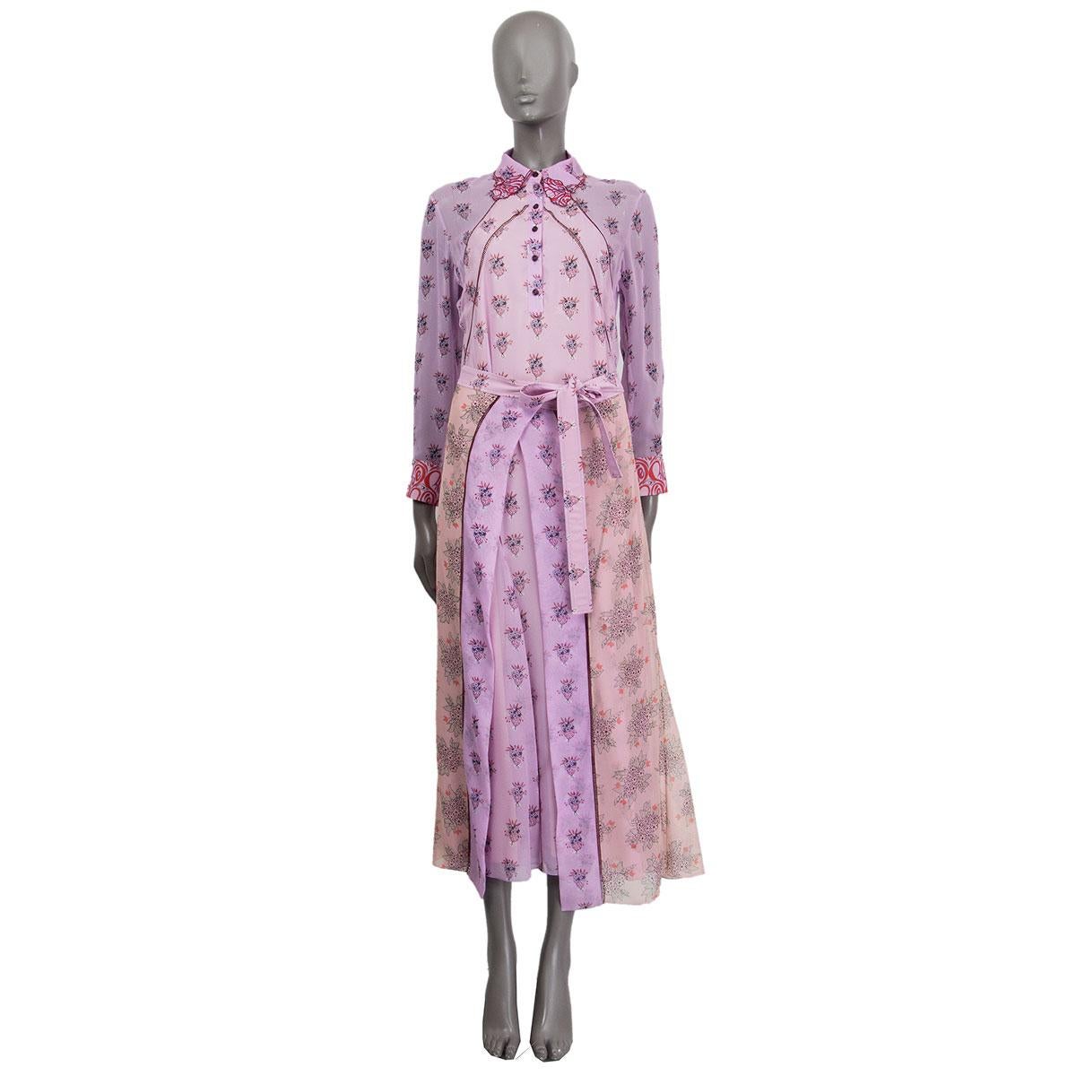 100% authentic Chloé shirt wrap dress in lilac, red, purple and burgundy in silk (100%) with a floral print. Features two long side openings and long sleeves with two-button cuffs. Comes with a slip dress in nude silk (100%). Closes with a concealed