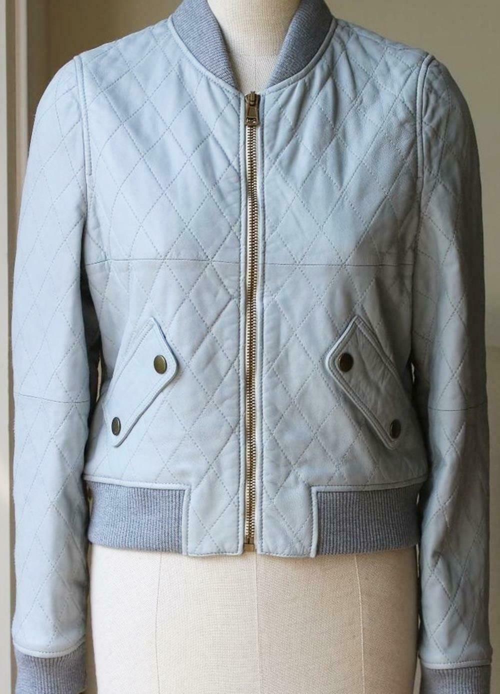 Crafted from butter soft leather in a pale washed out blue, this chic bomber jacket by Chloé is quilted for a textural twist. Fully lined and complete with twin flap pockets. Ribbed collar. Front zip fastening. Quilted. Twin press stud flap pockets.