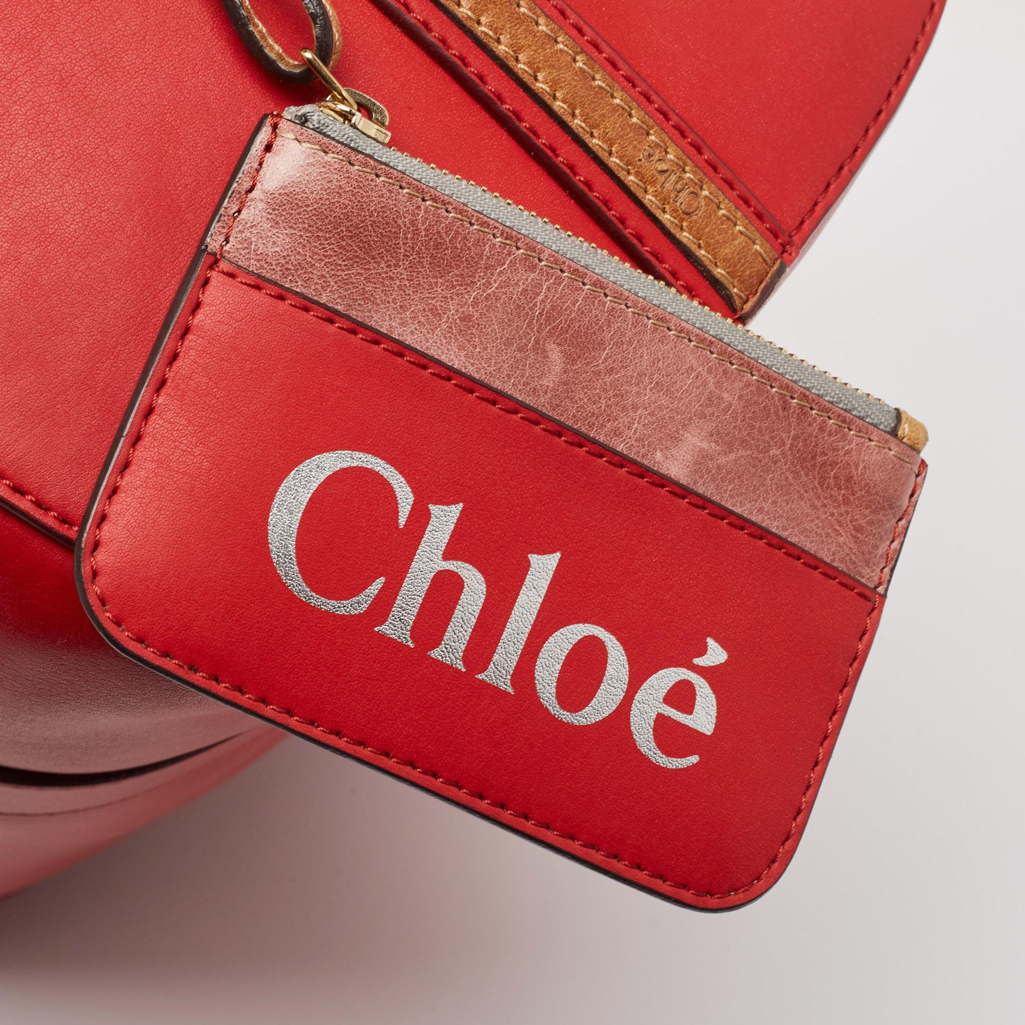 Chloe Red/Brown Leather Buckle Duffel Bag In Good Condition For Sale In Dubai, Al Qouz 2