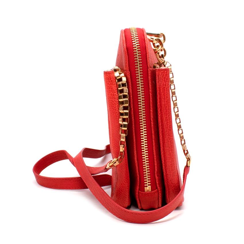 Chloe Red Leather Chain Strap Shoulder Bag
 

 - Crafted from grained calfskin leather in vivid red hue
 - Flat shape, with a trio of compartments including a zip-top main section, and 2 slip opening side pockets
 - Gold-tone metal chain and leather