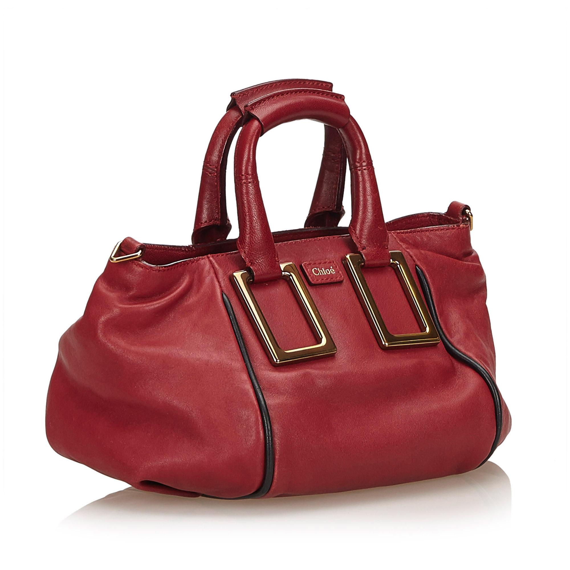 The Ethel features a leather body, rolled handles, detachable shoulder strap, top zip closure, and an interior slip pocket. It carries as B+ condition rating.

Inclusions: 
This item does not come with inclusions.

Dimensions:
Length: 14.00