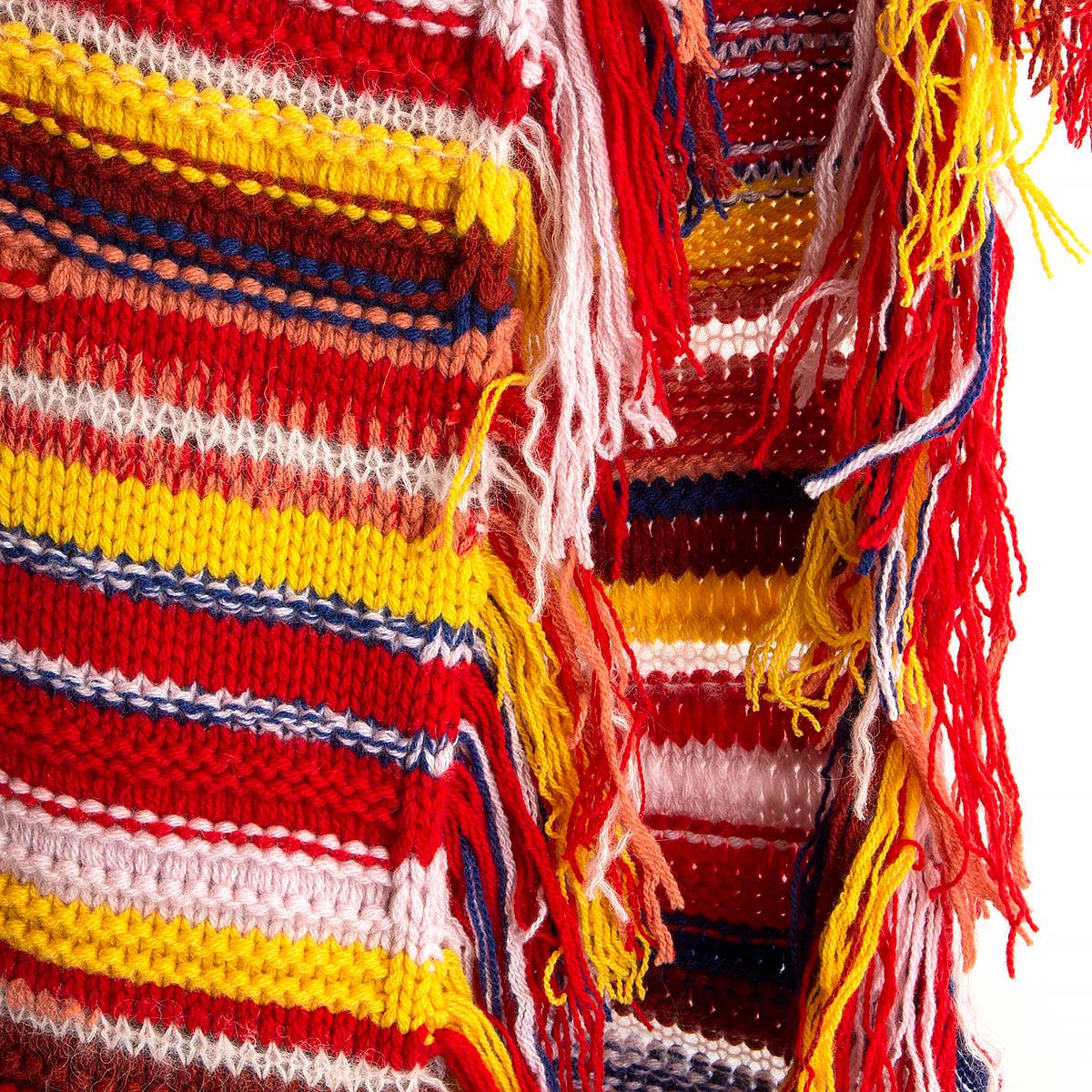 100% authentic Chloé striped long shawl in red, yellow, blue, salmon, baby pink and brown cashmere (93%), wool (5%), alpaca (1%) and polyamide (1%) panels with fringed trims. Has been worn and is in excellent condition. 

Measurements
Width	36cm