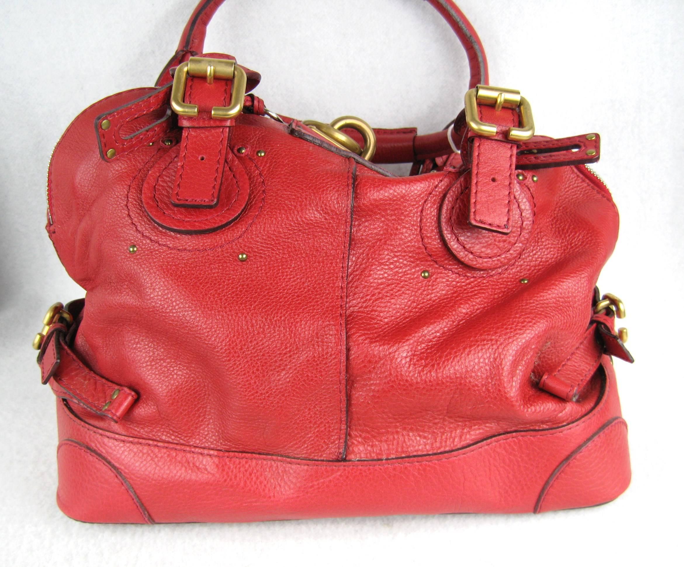 Stunning Red Leather Chloe Bag. Large over sized Brass lock with Double Handles Tags still attached. Stored away till now. Measuring 18