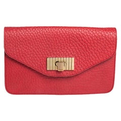 Chloe Rote Clutch aus gekörntem Leder in Lachsrosa