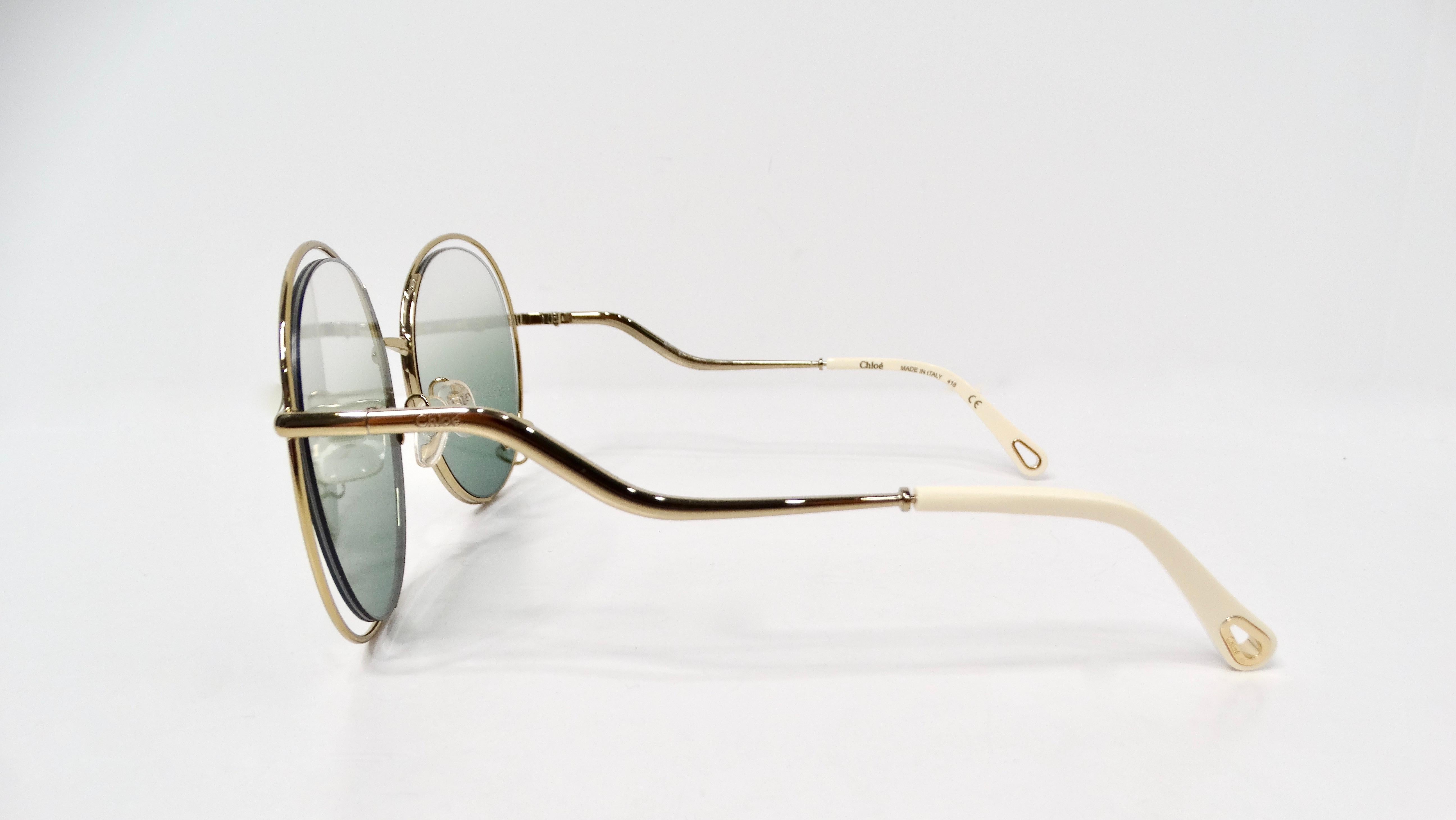 Introducing the Chloe Round Oversized Green Gradient Gold-Tone Metal Frame Sunglasses, the epitome of chic elegance and playful sophistication. These stunning sunglasses feature a unique oversized silhouette that flatters the face while offering