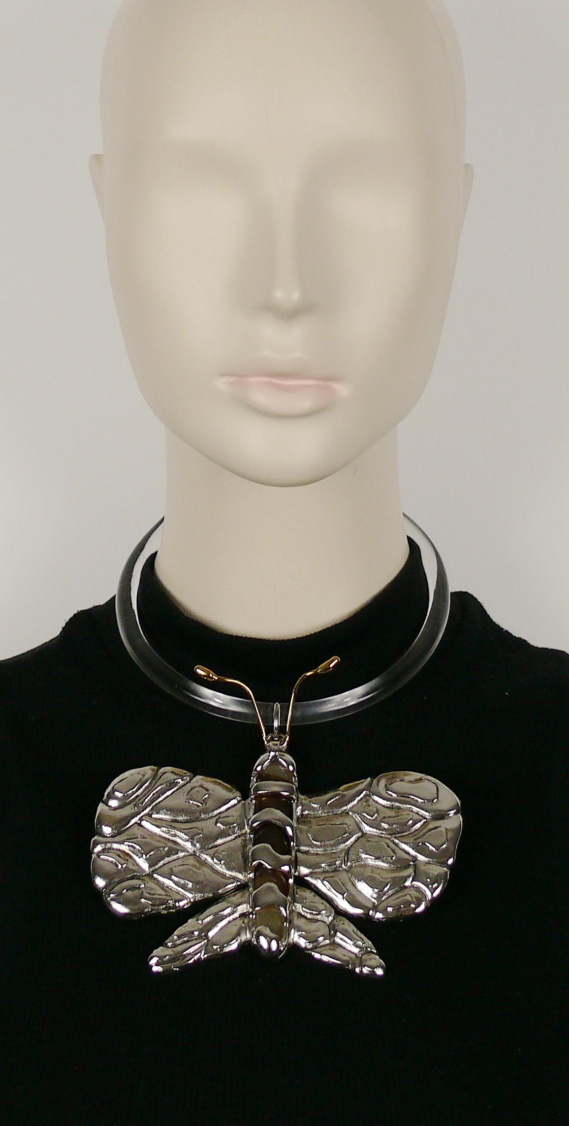 CHLOE chunky butterfly pendant collar necklace made of plexiglass, two toned metal (silver and gold) and a marbled lucite insert encaged in the butterfly body.

From the Spring/Summer 2004 Collection.
As seen on the CHLOE runway and ad