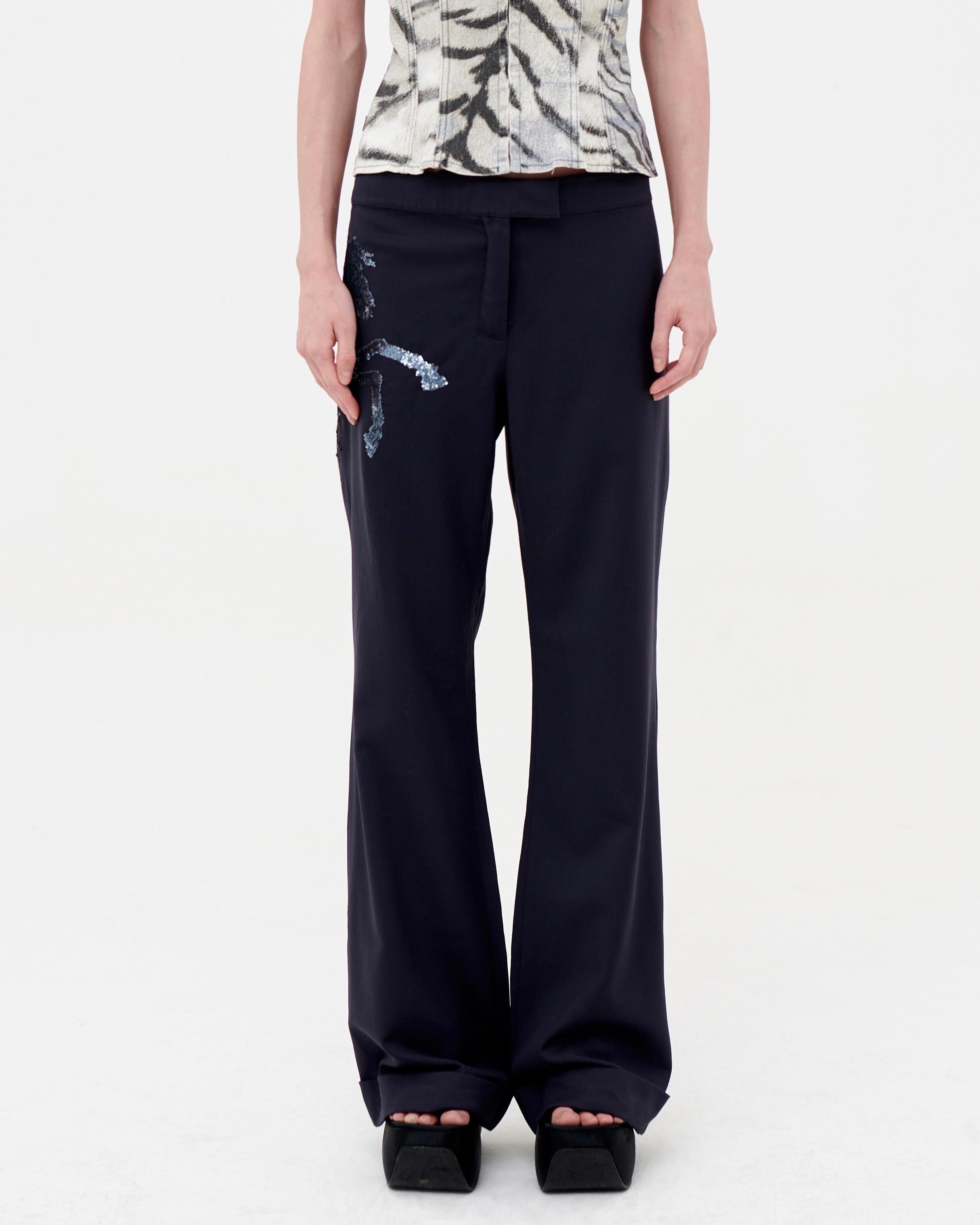 • Chloè by Stella McCartney
• Navy blue wool flared trousers
• Blue sequins horse motif
• Runway piece