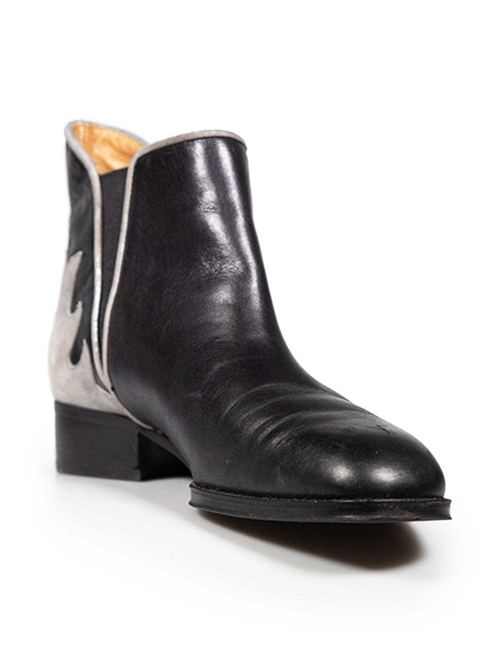 CONDITION is Very good. Minimal wear to boots is evident. Light signs of wear to the uppers with a light abrasion on the left shoe, the colouring of the metallic suede back counters is light fading and general creasing of leather is evident on both