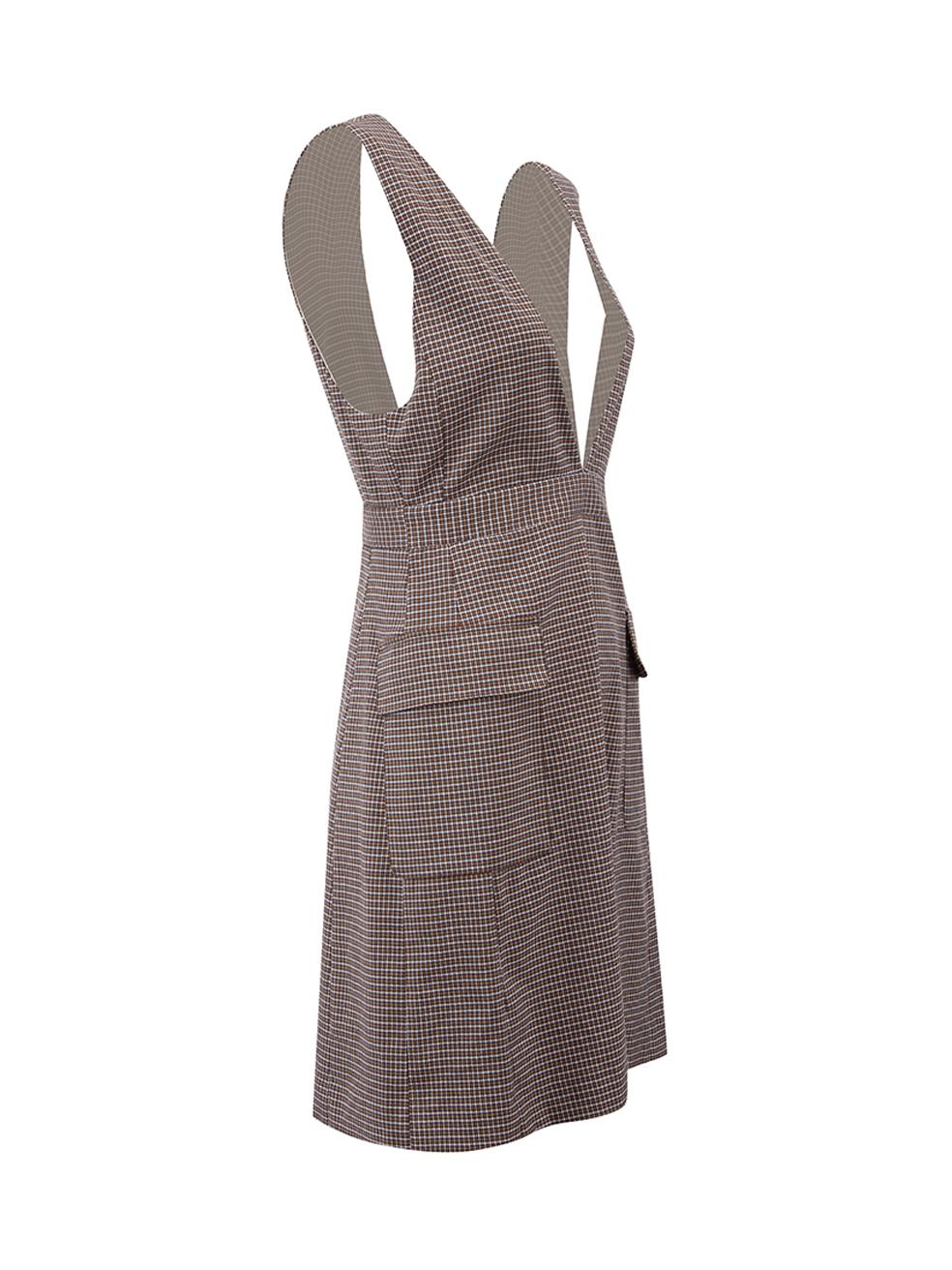 CONDITION is Very good. Minimal wear to dress is evident. Minimal wear to the left-side of the dress lining with a pull to the weave on this used See by Chloé designer resale item.

Details


Brown

Polyester

Pinafore dress

Houndstooth
