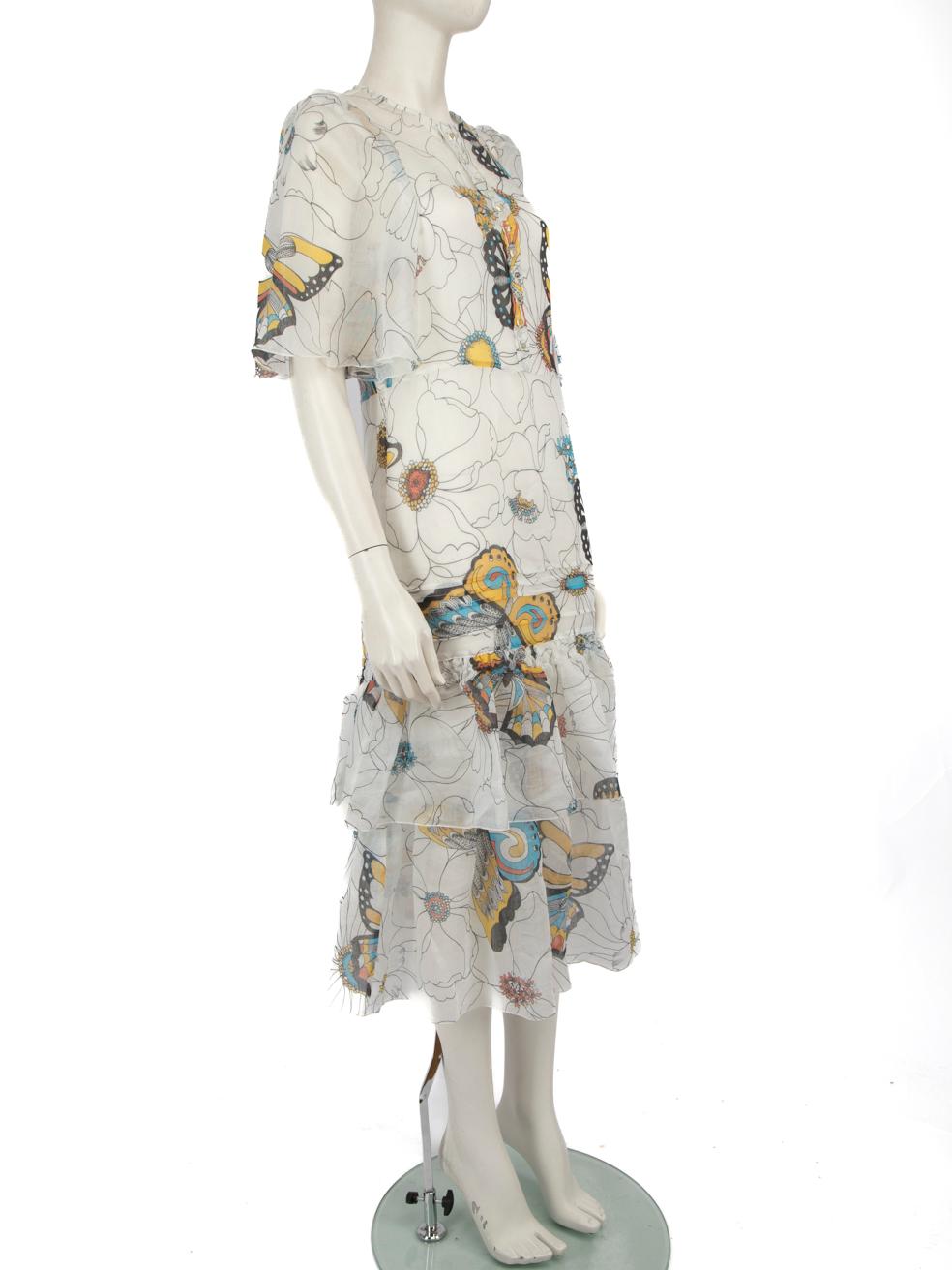 CONDITION is Very Good. Hardly any visible wear to dress is evident on this used See By Chloé designer resale item.
 
 Details
 
 
 See By Chloé 
 
 White
 
 Cotton
 
 Dress
 
 Midi
 
 Short sleeves
 
 Sheer
 
 Inner slip dress
 
 Butterfly pattern
