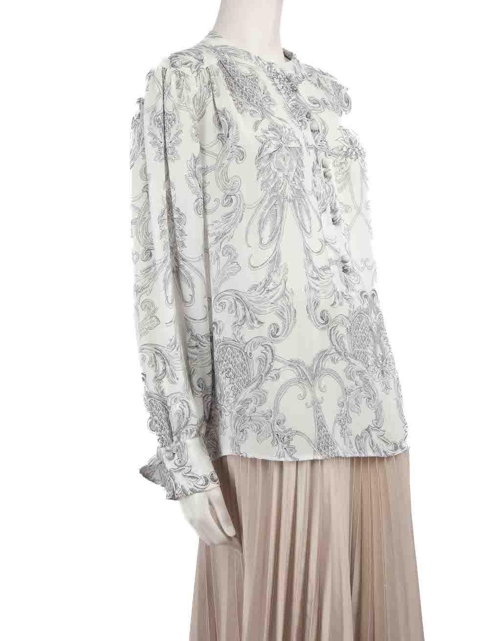 CONDITION is Very good. Minimal wear to blouse is evident. Minimal wear to the front with plucks to the weave on this used See by Chloé designer resale item.
 
 Details
 White
 Polyester
 Blouse
 Abstract floral pattern
 Long sleeves
 Button up