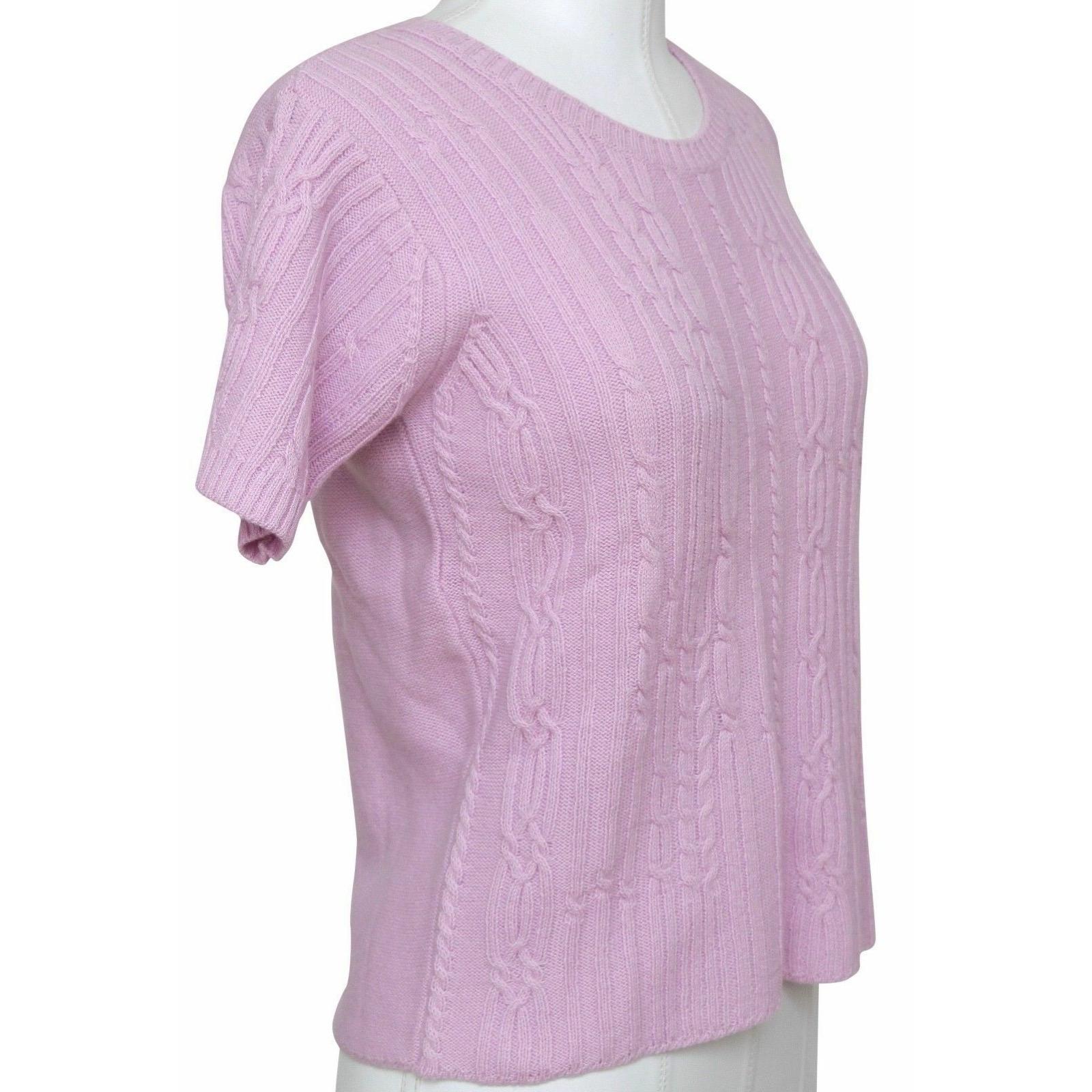 GUARANTEED AUTHENTIC CHLOE PINK SHORT SLEEVE WOOL SWEATER

Design:
- Beautiful pink wool cable knit sweater.
- Short sleeve.
- Crewneck.
- Slip on.

Size: S

Material: 100% Wool

Measurements (Approximate laid flat, material has give):
- Shoulder to