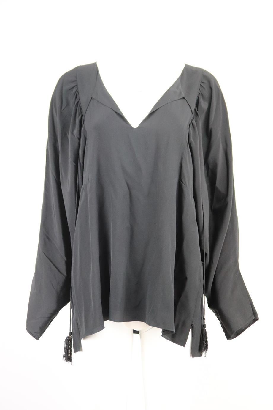 Chloé silk blouse. Black. Long sleeve, v-neck. Slips on. 100% Silk. Size: FR 40 (UK 12, US 8, IT 44). Bust: 44 in. Waist: 44 in. Hips: 50 in. Length: 26 in. Very good condition - No sign of wear; see pictures.
