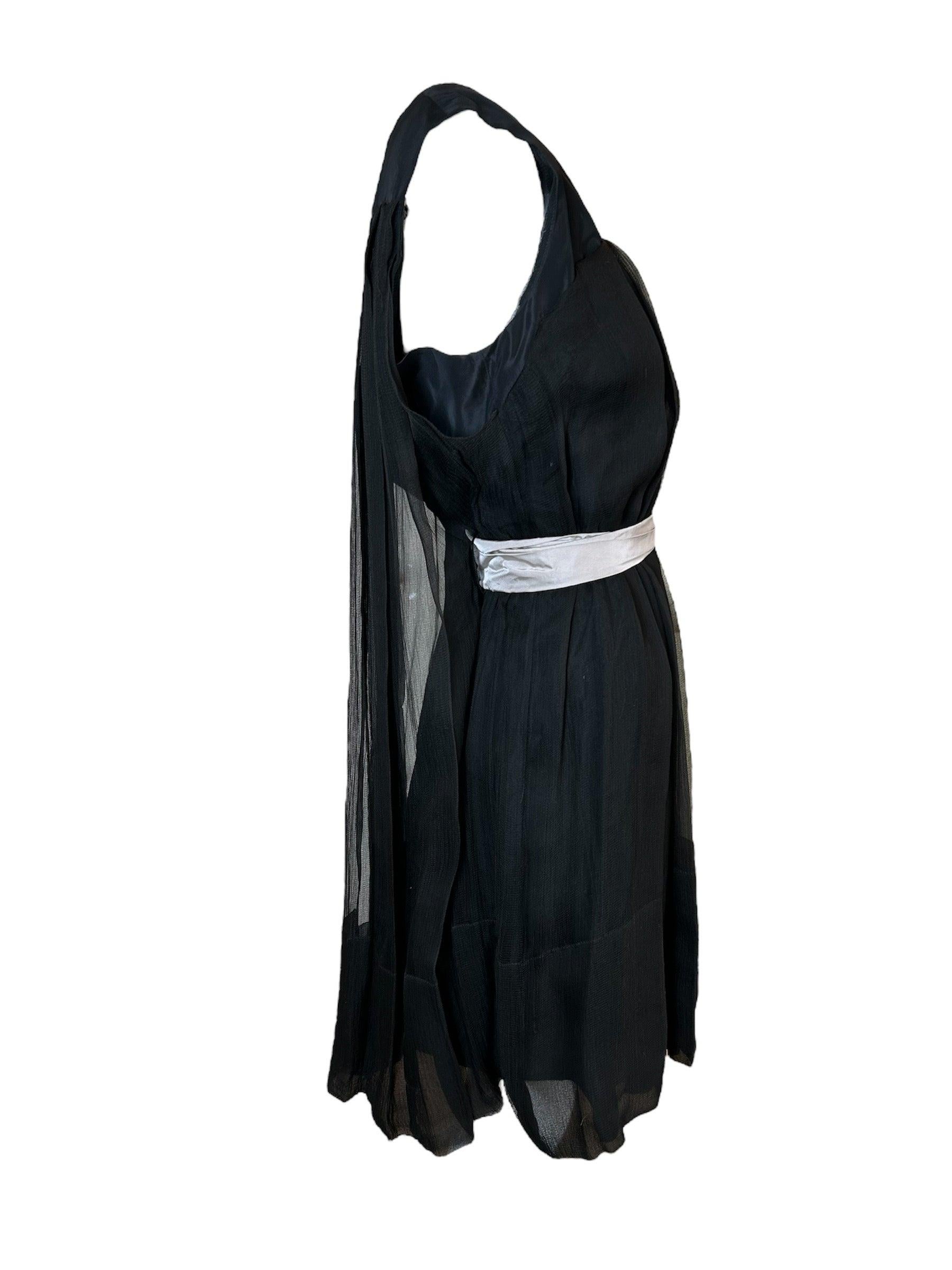 Chloé brings back sophisticated 60's cocktail with this fantastic silk chiffon pleated dress. This classic silhouette reminds us of Audrey Hepburn, even alluding to a Catherine Deneuve moment of French sophistication. The wrap around belt sash