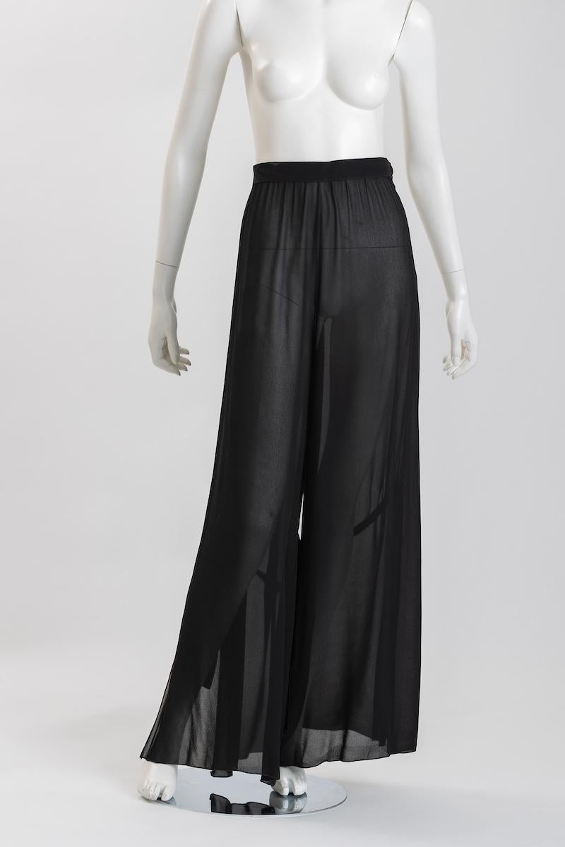 Elegant Chloe sheer silk chiffon palazzo pants with ribbon ties.
Ribbons attach with loops, and may be tied at any side
Gathered waist has hidden left side zipper. Covered button closure. 
Labeled, Chloe,  Made in France.

Measurements:  20.5