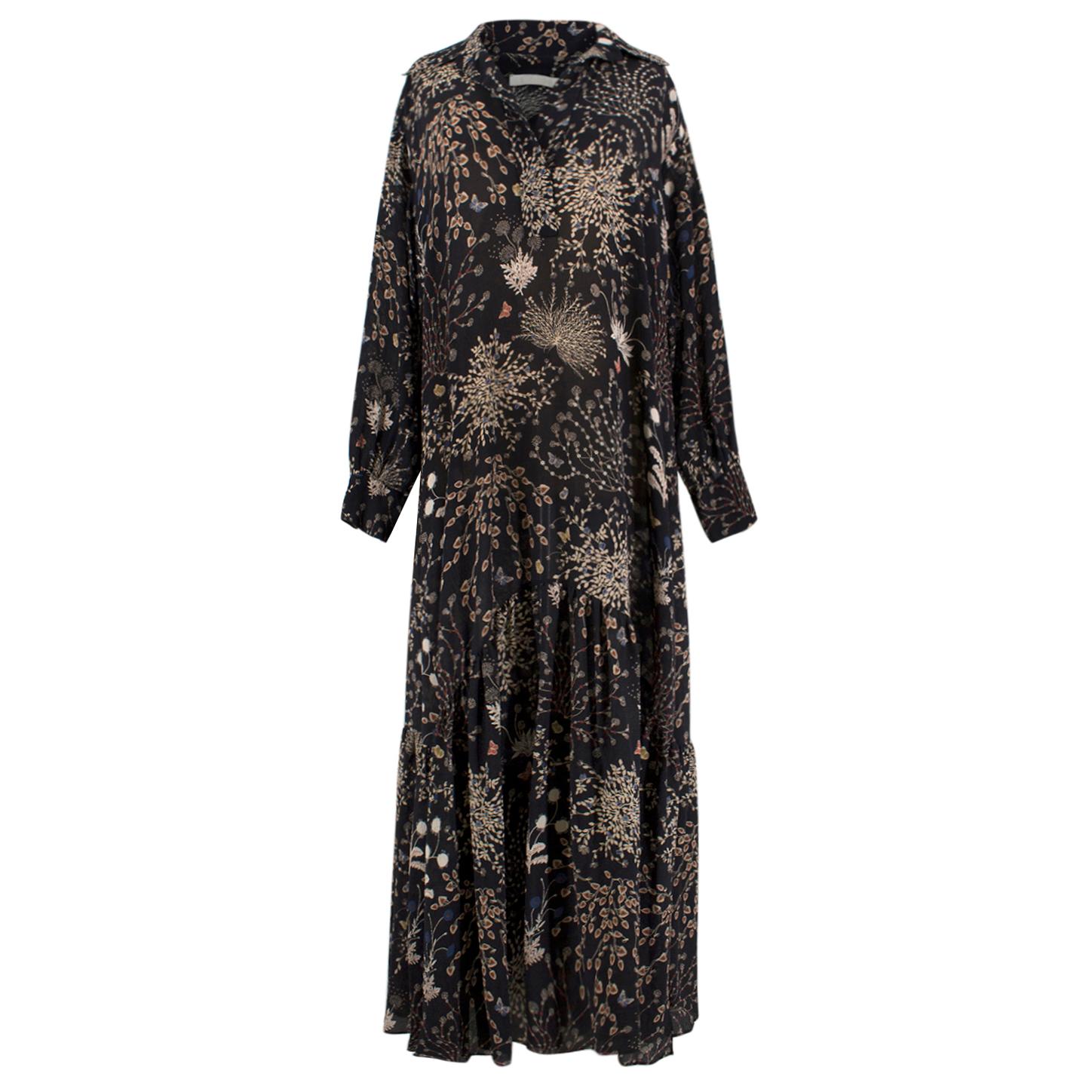 Chloe Silk Floral Maxi Dress

- Black in colour with muted floral print all-over
- Collared
- Drop waist
- Open collar
- Long sleeves with fabric-coated buttoned cuffs
- Maxi-length

Please note, these items are pre-owned and may show some signs of