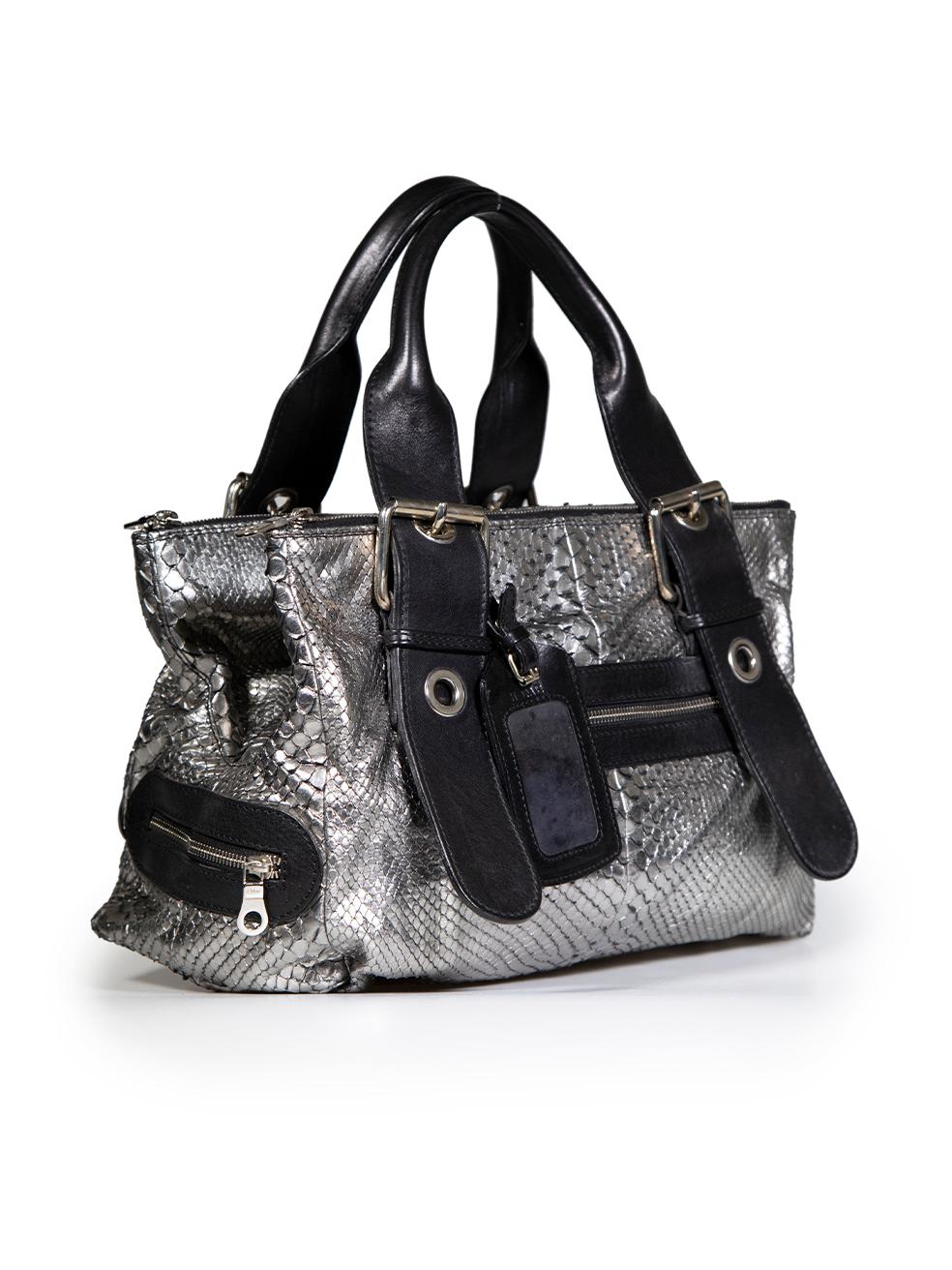 CONDITION is Good. Minor wear to bag is evident. Light wear to the exterior with some very mild tarnishing of the hardware details, curling of the snakeskin and creasing of the leather seen throughout. Spots of discolouration are also found through