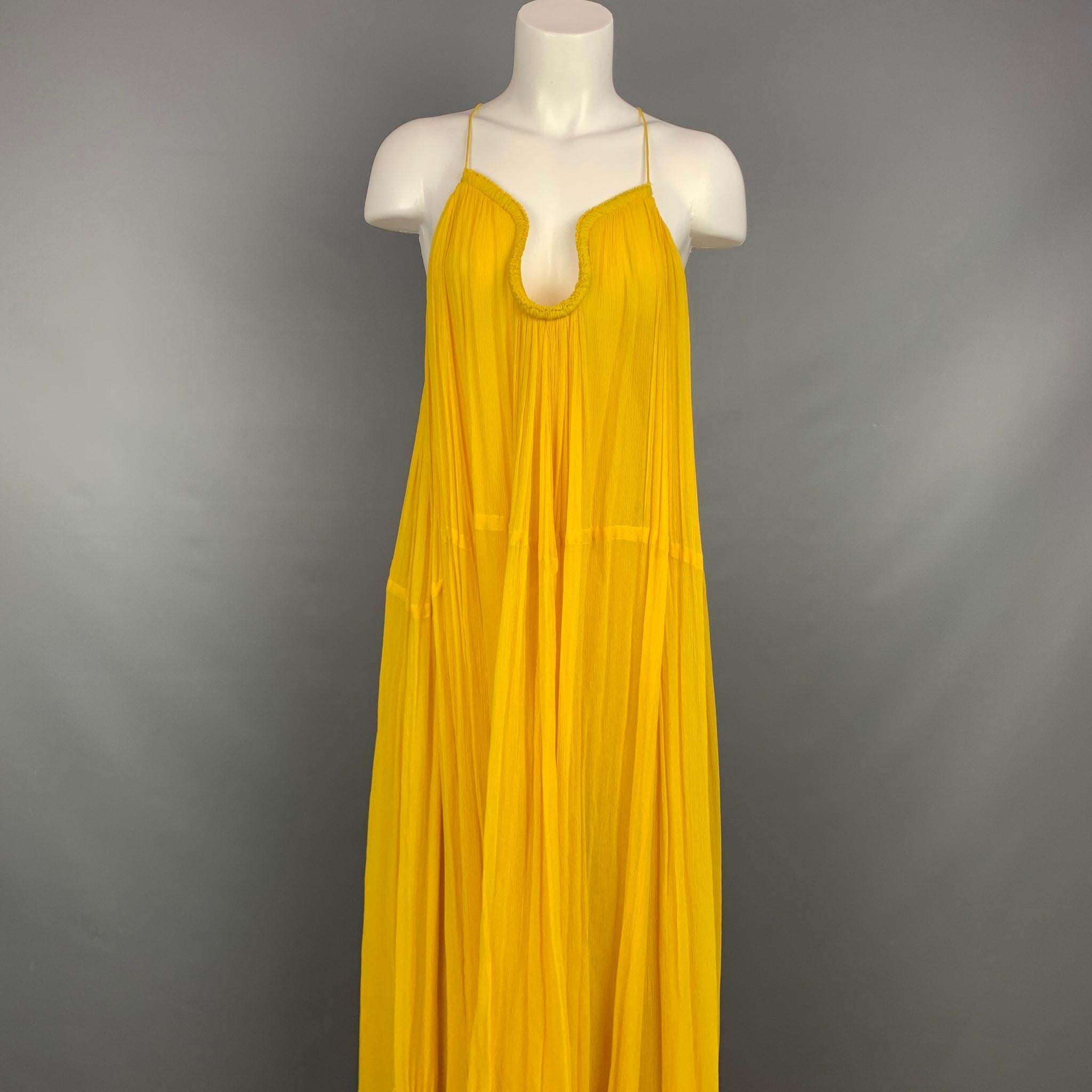 CHLOE S/S 15 dress comes in a corn yellow pleated silk-viole featuring a maxi style, pleated, and a metal piped curved neckline with spaghetti straps. Made in France.

Good Pre-Owned Condition. One run at lower area.
Marked: FR 36
Original Retail