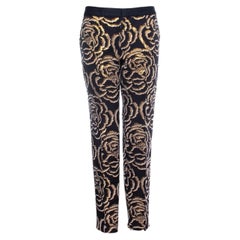 Chloe Stora, trousers with golden flowers