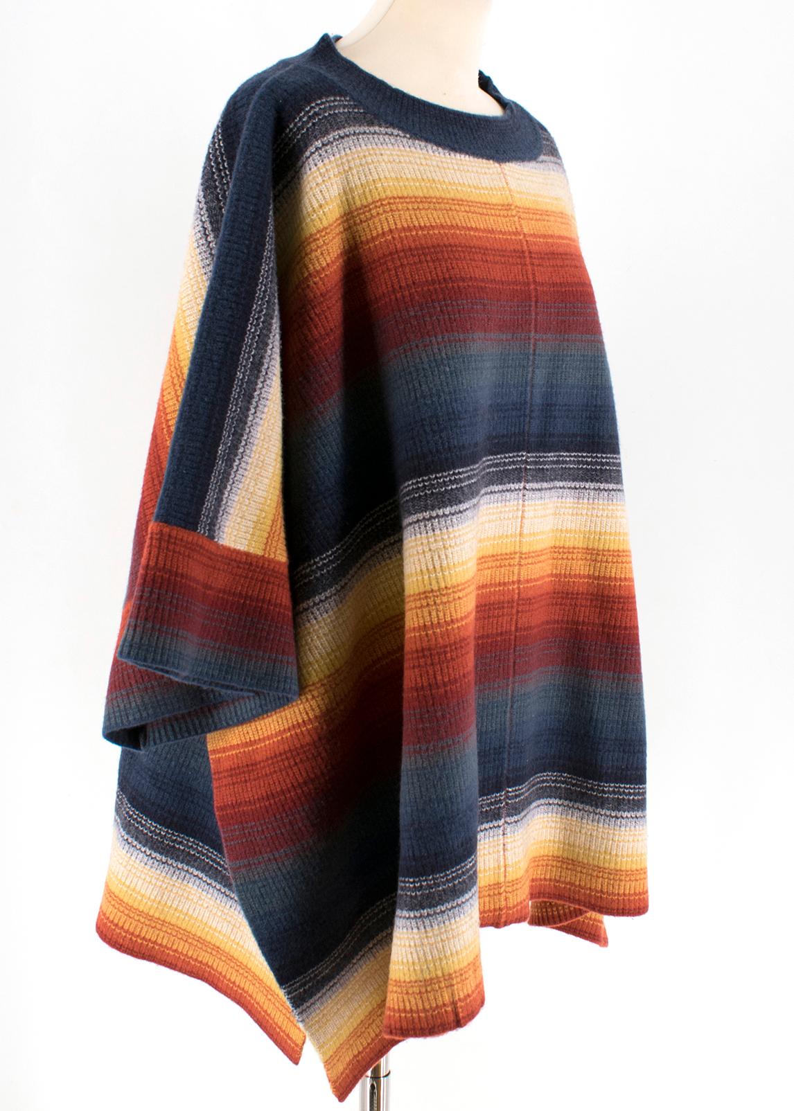 Chloe Stripe Felted Wool & Cashmere Poncho

Oversized poncho
Colourful serape stripes  Round neck
Elbow sleeves
Mid-Weight material

Please note, these items are pre-owned and may show some signs of storage, even when unworn and unused. This is