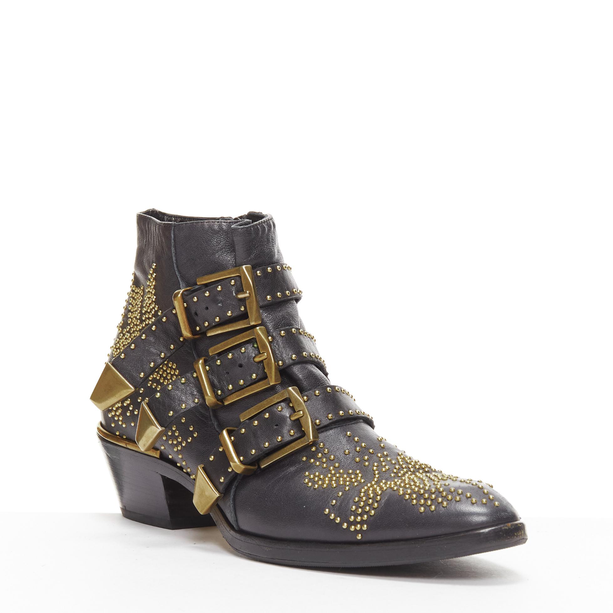 CHLOE Susanna black gold micro stud floral embellished buckle ankle boot EU37
Reference: TGAS/D01152
Brand: Chloe
Model: Susanna
Material: Leather, Metal
Color: Black, Gold
Pattern: Floral
Closure: Zip
Lining: Black Leather
Extra Details: