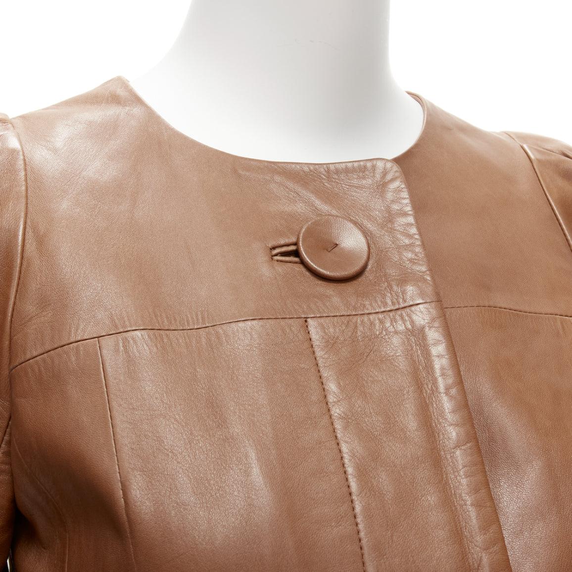 CHLOE tan brown lambskin leather big button cropped jacket FR36 S
Reference: SNKO/A00254
Brand: Chloe
Material: Leather
Color: Brown
Pattern: Solid
Closure: Button
Lining: Grey Fabric
Extra Details: Dart at shoulders. Fully lined.
Made in: