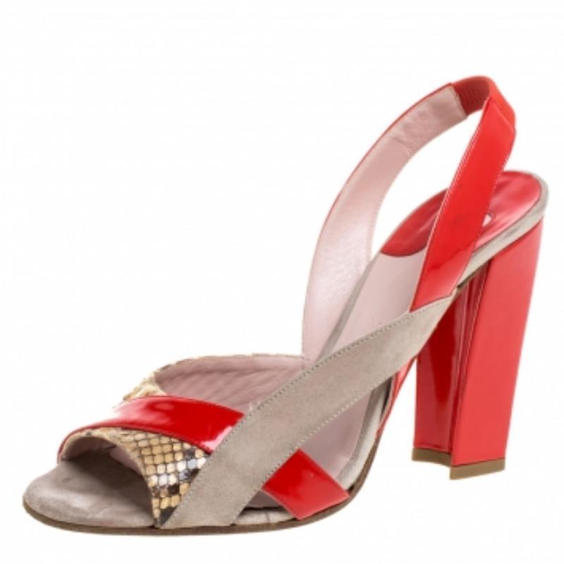 Designed to add style to the simplest of outfits, these Chloe sandals will be an amazing addition to your wardrobe! They are crafted from patent leather and suede along with python trims into an open toe silhouette. They flaunt slingbacks and stand