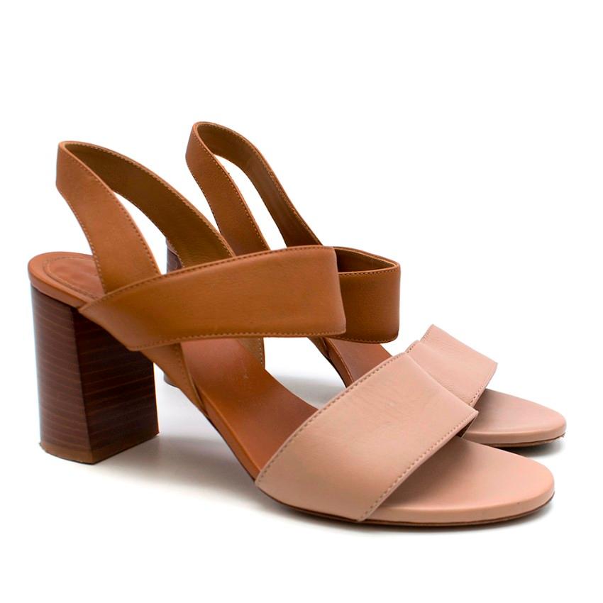 Chloe Mid Heel Two Tone Leather Block Sandals. Crafted in Italy from smooth leather with an elastic strap and mid heel making it perfect for day and night. RRP £495

Please note, these items are pre-owned and may show signs of being stored even when