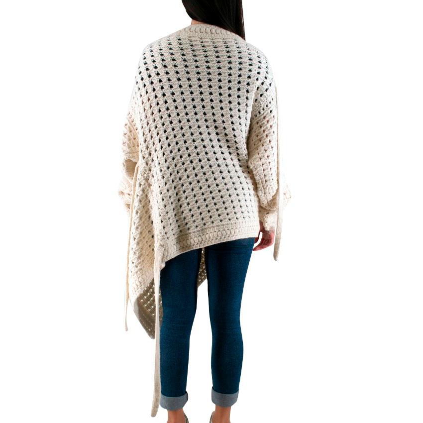 Chloe Off-white Asymmteric Crochet Knit Cardigan

- Asymmetric Cardigan
- Brand color: Vanilla
- Crochet Knit
- Multi-tie purpose
- Heavy-weight

Please note, these items are pre-owned and may show some signs of storage, even when unworn and unused.
