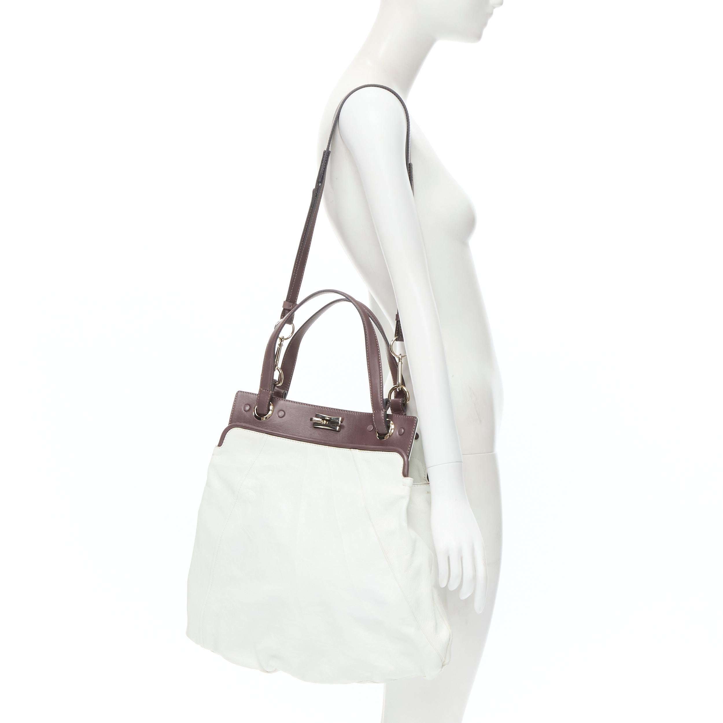 CHLOE white crinkled leather brown handle clasp lock large tote bag 
Reference: CELG/A00038 
Brand: Chloe 
Material: Leather 
Color: White 
Pattern: Solid 
Closure: Lock 
Extra Detail: Gold-tone hardware. Structured brown leather top. Soft crinkle