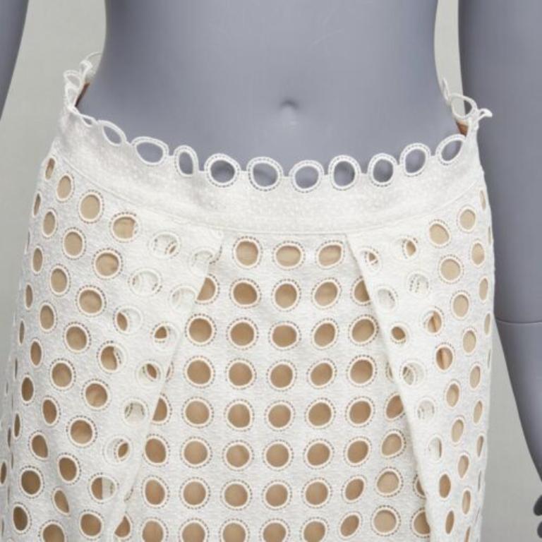 CHLOE white embroidery anglais eyelet layered silk lined skirt FR34 XS
Reference: SNKO/A00299
Brand: Chloe
Material: Cotton, Blend
Color: White, Cream
Pattern: Solid
Closure: Zip
Lining: Nude Silk
Extra Details: Back zip. Silk lined.
Made in: