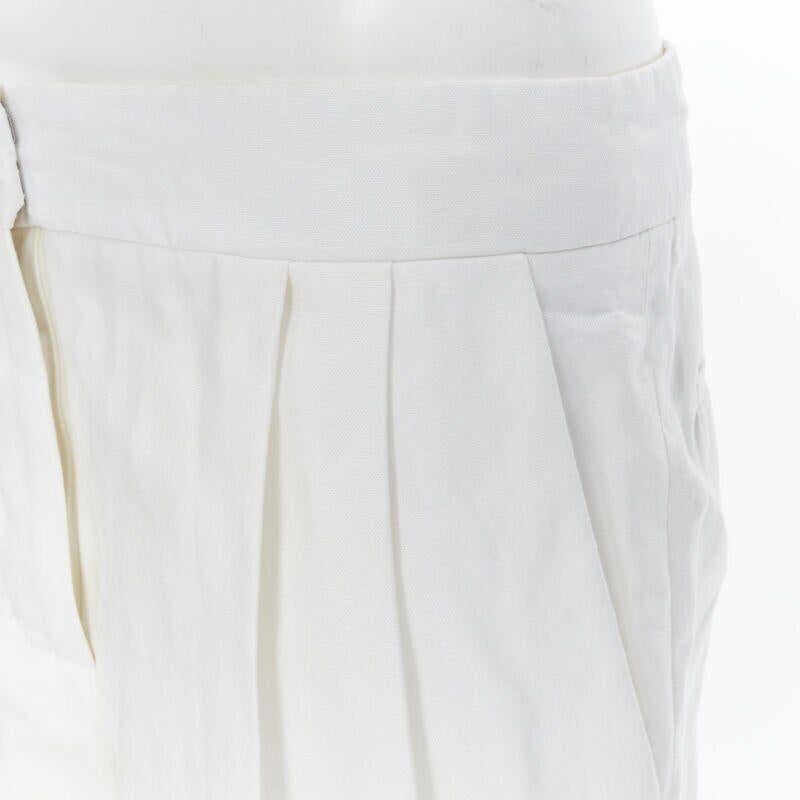 CHLOE white flax cotton blend pleat dark long length culotte shorts FR40
Reference: CNPG/A00014
Brand: Chloe
Material: Flax, Cotton
Color: White
Pattern: Solid
Closure: Zip
Extra Details: Concealed zip fly closure
Made in: