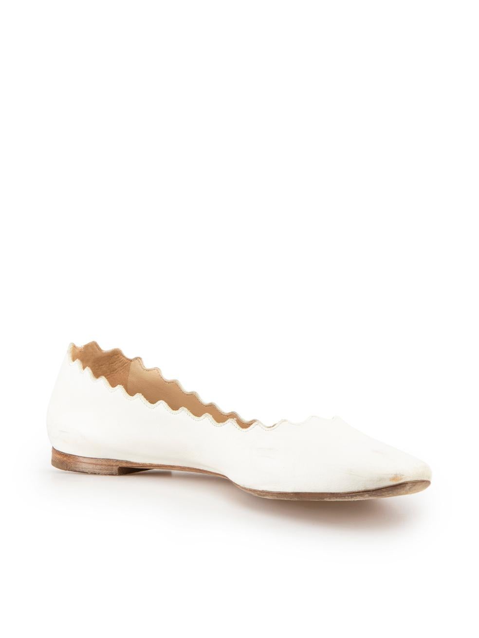 CONDITION is Good. General wear to shoes is evident. Moderate signs of wear to both sides, toes and heels of both shoes with discoloured marks and abrasions to the leather on this used Chloé designer resale item.
 
 Details
 White
 Leather
 Slip on