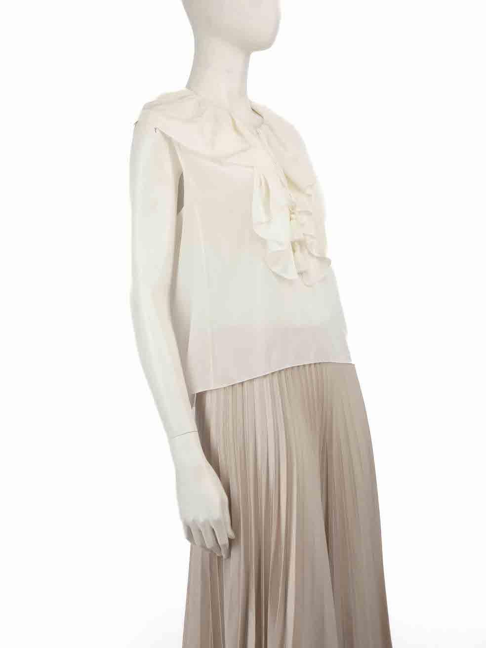 CONDITION is Very good. Hardly any visible wear to top is evident on this used Chloé designer resale item.
 
 
 
 Details
 
 
 White
 
 Silk
 
 Top
 
 Tassel detail
 
 Ruffles
 
 Sleeveless
 
 V-neck
 
 
 
 
 
 Made in Madagascar
 
 
 
 Composition
