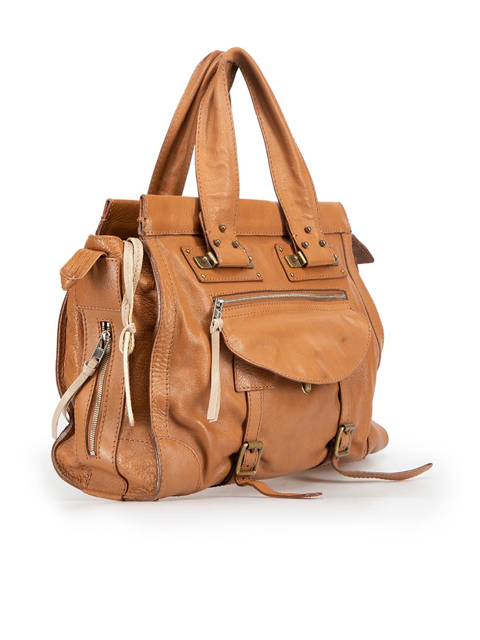 CONDITION is Good. Minor wear to bag is evident. Light wear to the lining, front and back with discoloured marks on this used Chloe designer resale item. 



Details


Brown

Leather

Top handle tote bag

1 front flap

4x exterior