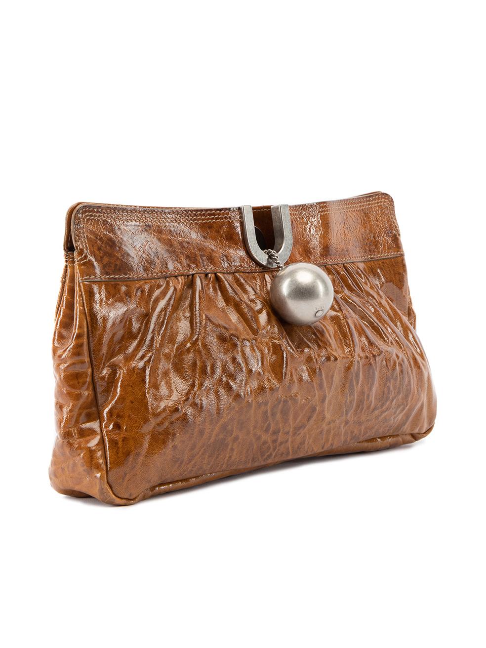 CONDITION is Very good. Minimal wear to clutch is evident. Minimal wear to silver ball clasp on this used Chloe designer resale item.   Details  Brown Patent leather Medium clutch Wrinkled design Silver tone hardware Ball clasp with magnetic button