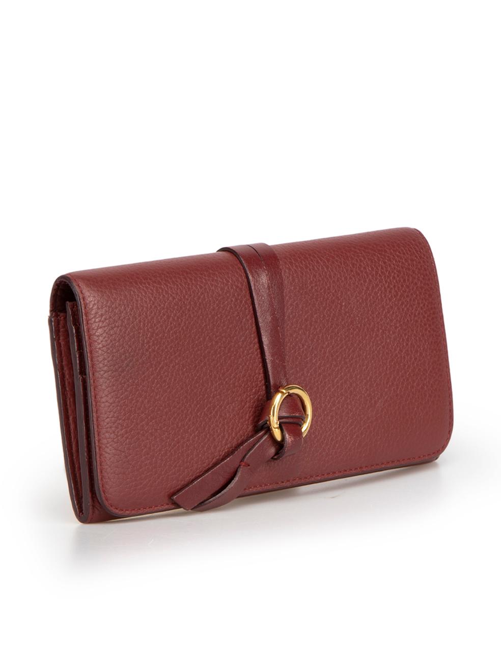 CONDITION is Very good. Minimal wear to purse is evident. Minimal wear to the front leather straps with scuffing on this used Chloé designer resale item. This item comes with original dust bag.



Details


Burgundy

Leather

Wallet

Gold tone