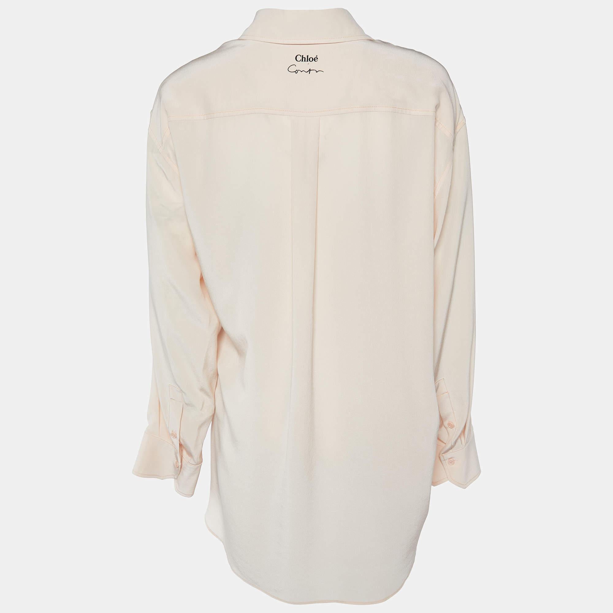 A delightful creation from Chloe x Corita Kent, this shirt strikes right balance between style and comfort. It is decorated with chick slogan detailing and flaunts long sleeves along with a comfortable fit.

