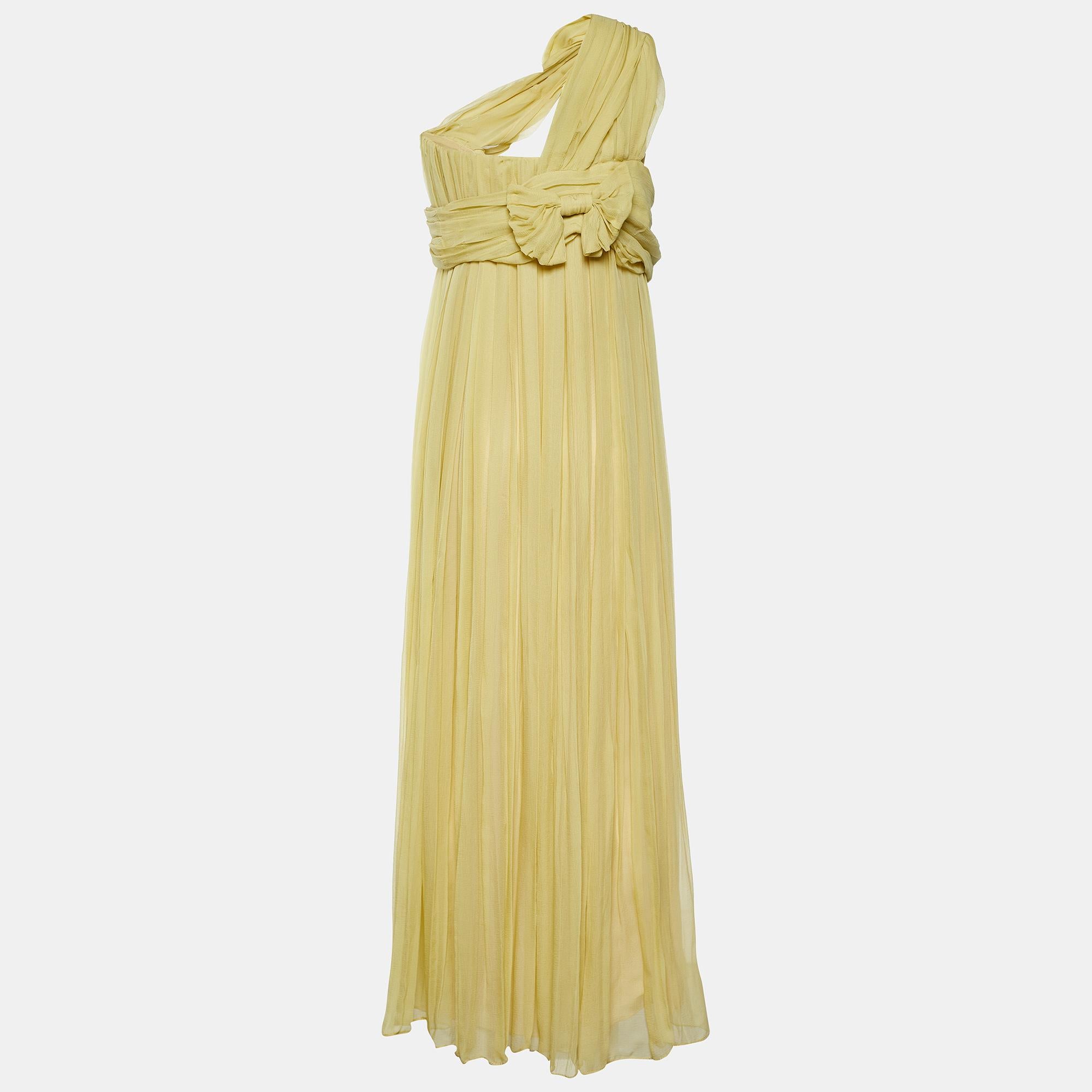Chloe's new creation spells out subtle glam and gracefulness quite effortlessly. The one-shoulder silhouette complemented by soft georgette will make you look straight out of a dream. The dress has pleated formations, with its skirt embracing a