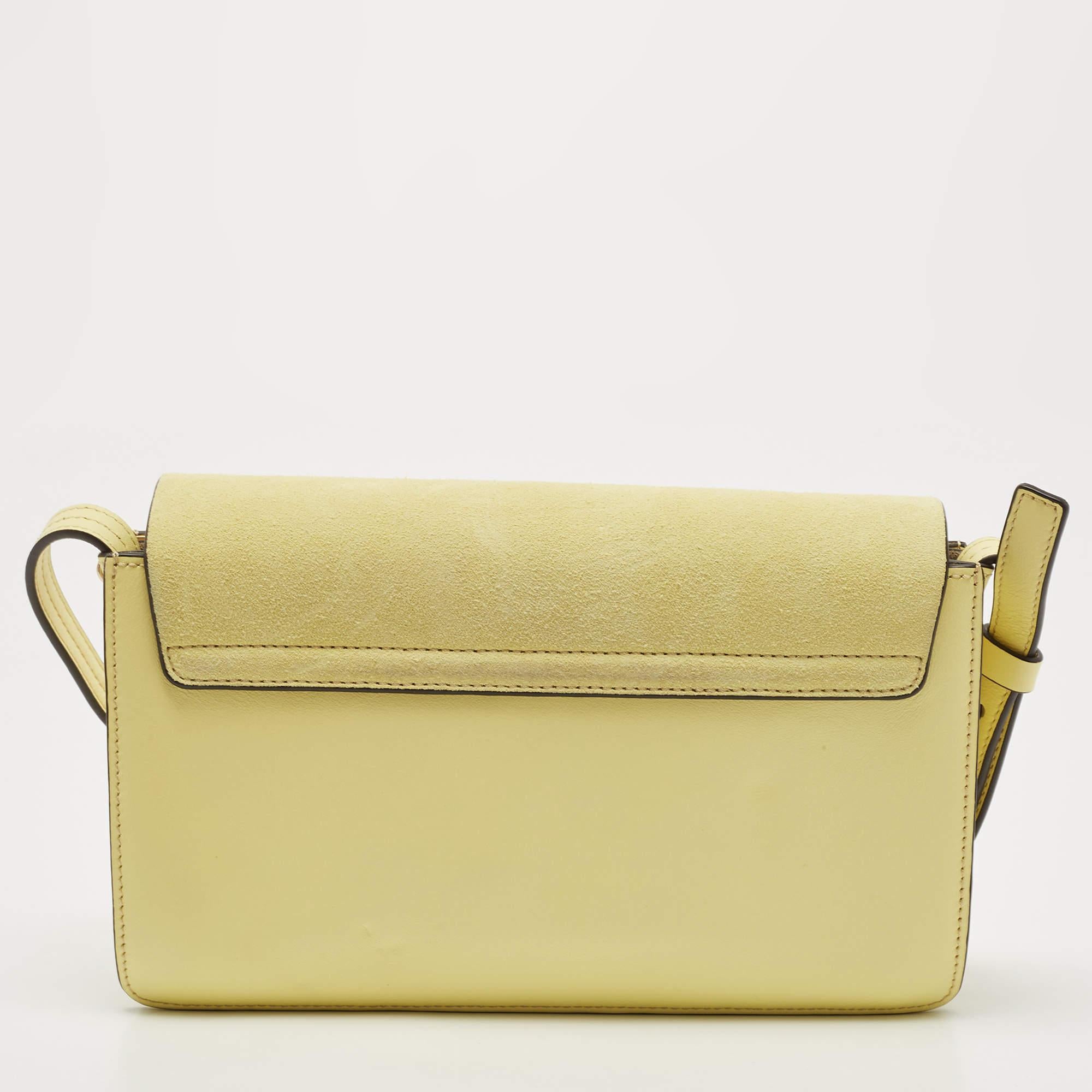 You are going to love owning this Faye shoulder bag from Chloe, as it is well-made and brimming with luxury. The bag has been crafted from leather and designed with a suede flap with chain detail and well-sized suede compartments for your